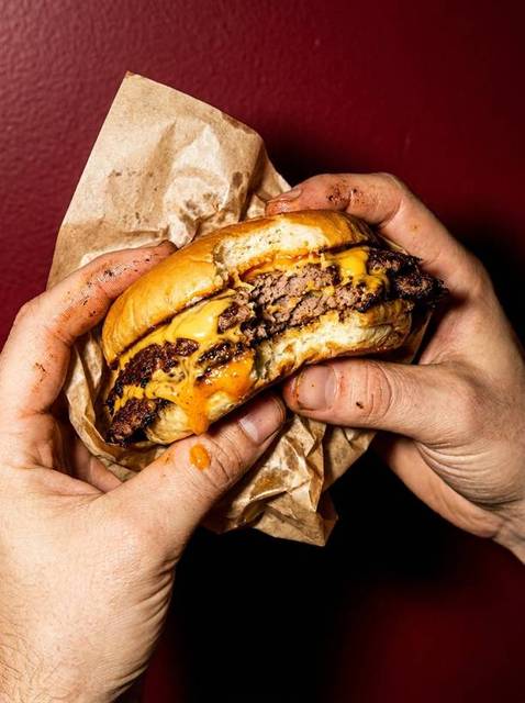 Burger in hand